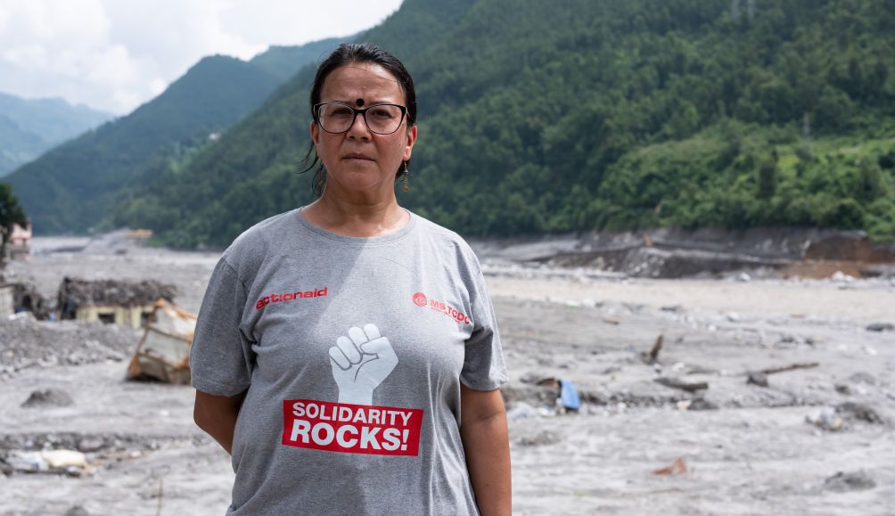 Sujeeta Mathema, Executive Director of ActionAid Nepal, at a flood-affected area in Tupche, Nuwakot district, Nepal after the floods.
