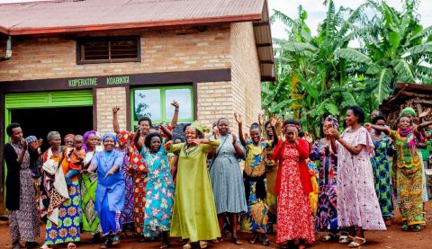 Women farmers in Rwanda celebrating their achievements through the Improving Food Security Project.  Gifts in Wills funds vital projects like these, allowing women to create long term sustainable changes to support their families and communities. 