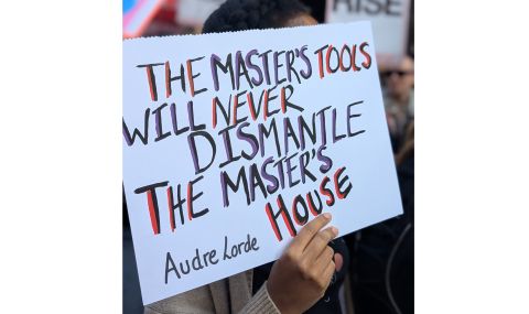 Audre Lorde's famous quote, "the master's tools will never dismantle the master's house," argues that systems of oppression, like patriarchy and white supremacy, cannot be dismantled using the very tools and tactics they were built with.