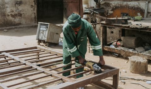Anifa has learned to craft gates, chairs, beds, and other metal products and is putting her new skills to use in her family’s workshop.