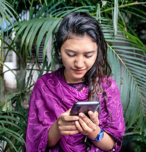 Girl checking her mobile phone