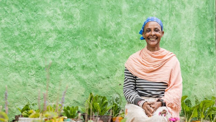 Woman sitting in her garden