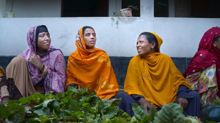 Women selling vegetables at a farmer's market